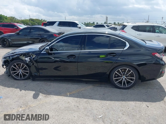 2021 BMW 3 Series 330i with VIN 3MW5R1J09M8B93600, listed as a IAAI auction lot 41735270 with 77,648 mi miles. Bid and sale history available at carsss.com. Image 14.