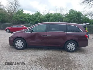 2013 Honda Odyssey LX with VIN 5FNRL5H25DB080209, listed as a IAAI auction lot 42123644 with 157,631 mi miles and . Bid and sale history available at carsss.com. Image 14.