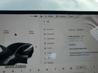 2021 Tesla Model Y Long Range z VIN 5YJYGDEE9MF067651, wystawiony jako Copart lot #55758165 z przebiegiem 61 348 mil mil oraz Czysty tytuł • Clean title. Historia ofert i sprzedaży dostępna na DreamBid. Obrazek 9.