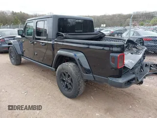 2021 Jeep Gladiator Freedom с VIN 1C6HJTAG7ML542804, выставлен на аукционе IAAI как лот 42146884 с пробегом 98 458 миль миль и . История ставок и продаж доступна на DreamBid. Изображение 3.