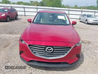 2016 Mazda CX-9 Touring z VIN JM3TCACY0G0101617, wystawiony jako IAAI lot #41850485 z przebiegiem 292 880 mil mil oraz . Historia ofert i sprzedaży dostępna na DreamBid. Obrazek 13.