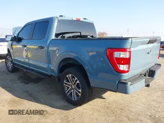 2023 Ford F-150 XL with VIN 1FTEW1EP4PKF58559, listed as a IAAI auction lot 40953057 with 7,900 mi miles. Bid and sale history available at carsss.com. Image 3.