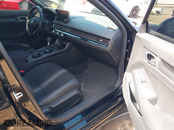 2023 Honda Civic Sport with VIN 2HGFE2F58PH557787, listed as a IAAI auction lot 42207827 with 51,885 mi miles and . Bid and sale history available at DreamBid. Image 5.