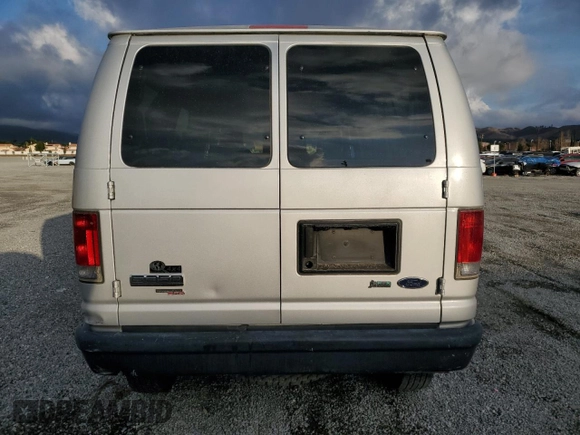 2009 Ford Econoline Passenger XL with VIN 1FBNE31L39DA86660, listed as a Copart auction lot 43724115 with 562,883 mi miles and Salvage title. Bid and sale history available at DreamBid. Image 6.