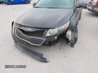 2015 Kia Optima LX with VIN 5XXGM4A77FG357303, listed as a IAAI auction lot 42078648 with 181,904 mi miles. Bid and sale history available at carsss.com. Image 6.