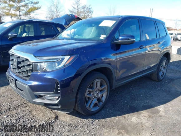 2023 Honda Passport EX-L with VIN 5FNYF8H51PB028045, listed as a IAAI auction lot 41609342 with 52,920 mi miles and . Bid and sale history available at DreamBid. Image 18.