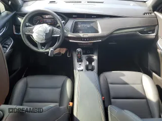 2021 Cadillac XT4 FWD Sport with VIN 1GYFZER44MF080872, listed as a Copart auction lot 86344534 with 23,865 mi miles and Salvage Title. Bid and sale history available at DreamBid. Image 8.