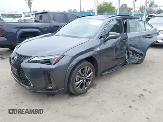 2023 Lexus UX 250h F Sport z VIN JTHB6JBH9P2132431, wystawiony jako IAAI lot #42137625 z przebiegiem 15 923 mil mil oraz . Historia ofert i sprzedaży dostępna na DreamBid. Obrazek 19.