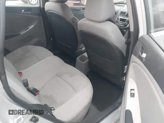 2015 Hyundai Accent GLS with VIN KMHCT4AE7FU930948, listed as a IAAI auction lot 42171213 with 150,543 mi miles and . Bid and sale history available at carsss.com. Image 8.