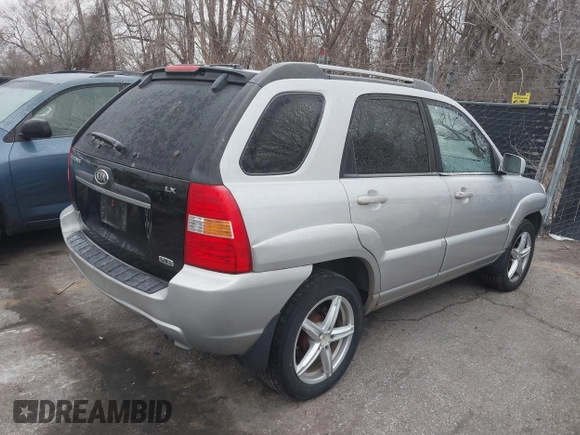2005 Kia Sportage LX with VIN KNDJE723257071317, listed as a IAAI auction lot 41547643 with 267,610 mi miles and . Bid and sale history available at carsss.com. Image 4.