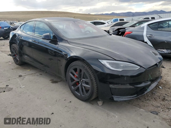 2024 Tesla Model S Plaid z VIN 5YJSA1E65RF543822, wystawiony jako Copart lot #48545205 z przebiegiem 2 473 mil mil oraz Szkoda całkowita • Salvage title. Historia ofert i sprzedaży dostępna na DreamBid. Obrazek 4.