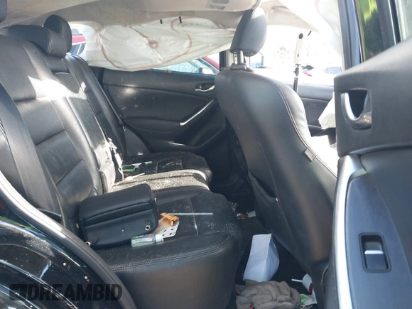 2016 Mazda CX-5 Grand Touring with VIN JM3KE4DY4G0909782, listed as a IAAI auction lot 41006111 with 30,135 mi miles. Bid and sale history available at carsss.com. Image 8.