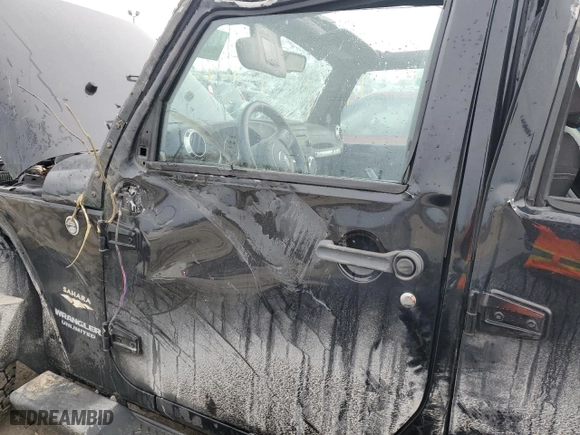 2013 Jeep Wrangler Unlimited Sahara with VIN 1C4BJWEG2DL525547, listed as a Copart auction lot 43263205 with 116,979 mi miles and Salvage Title. Bid and sale history available at carsss.com. Image 7.