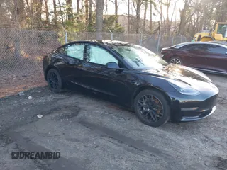 2021 Tesla Model 3 Standard Range Plus z VIN 5YJ3E1EA4MF875742, wystawiony jako IAAI lot #41573674 z przebiegiem Nie podano mil oraz . Historia ofert i sprzedaży dostępna na DreamBid. Obrazek 1.
