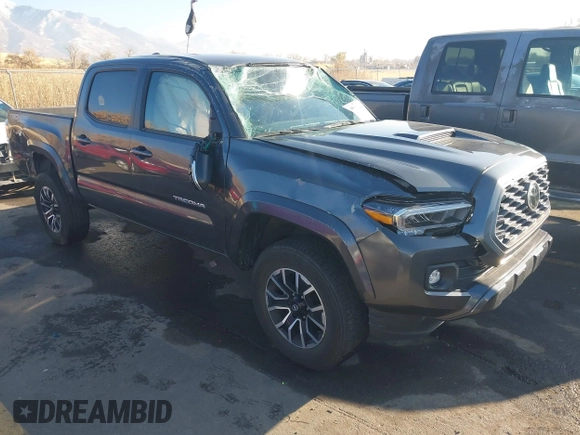 2023 Toyota Tacoma SR with VIN 3TMCZ5AN2PM553928, listed as a IAAI auction lot 40999044 with 9,210 mi miles and . Bid and sale history available at DreamBid. Image 1.