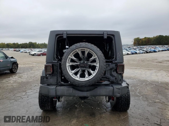 2018 Jeep Wrangler JK Unlimited Sport S with VIN 1C4HJWDGXJL837610, listed as a Copart auction lot 79299724 with 101,437 mi miles and Salvage Title. Bid and sale history available at carsss.com. Image 6.