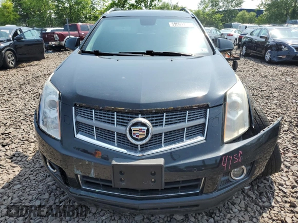 2011 Cadillac SRX Premium Collection z VIN 3GYFNFEY9BS606335, wystawiony jako Copart lot #59009285 z przebiegiem 152 828 mil mil oraz Szkoda całkowita • Salvage title. Historia ofert i sprzedaży dostępna na DreamBid. Obrazek 5.
