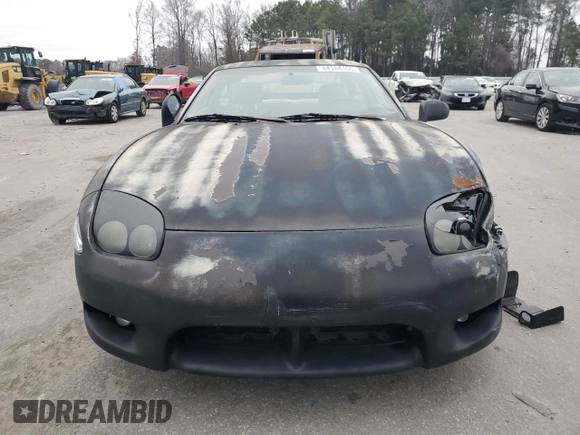 1998 Mitsubishi 3000GT z VIN JA3AM44H8WY000594, wystawiony jako Copart lot #44164155 z przebiegiem 92 227 mil mil oraz Czysty tytuł • Clean title. Historia ofert i sprzedaży dostępna na DreamBid. Obrazek 5.