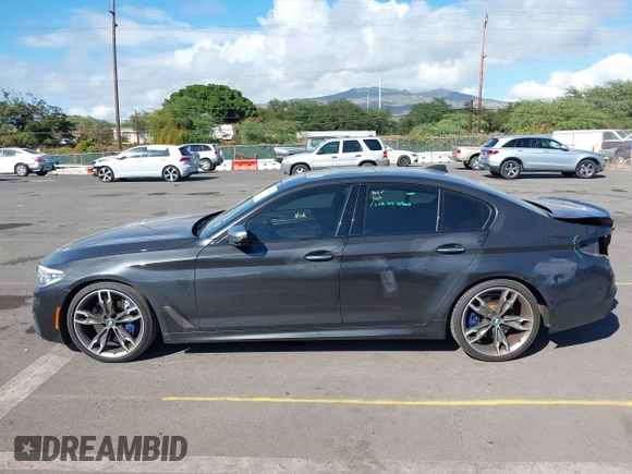 2018 BMW 5 Series M550i xDrive with VIN WBAJB9C51JB049513, listed as a IAAI auction lot 41146990 with 51,218 mi miles. Bid and sale history available at carsss.com. Image 15.