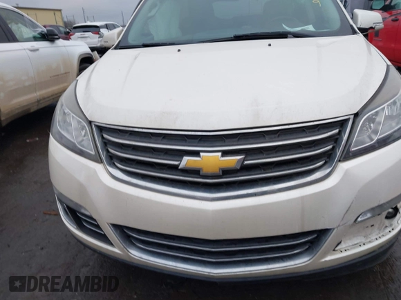 2014 Chevrolet Traverse LTZ z VIN 1GNKRJKDXEJ263349, wystawiony jako IAAI lot #41180521 z przebiegiem 141 564 mil mil oraz . Historia ofert i sprzedaży dostępna na DreamBid. Obrazek 11.