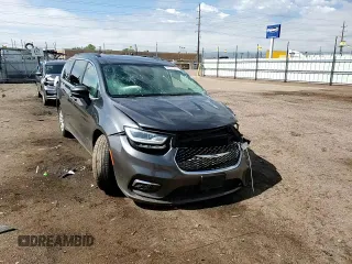 2022 Chrysler Pacifica Touring L with VIN 2C4RC1BG8NR158629, listed as a Copart auction lot 58541395 with 76,544 mi miles and Salvage title. Bid and sale history available at DreamBid. Image 14.