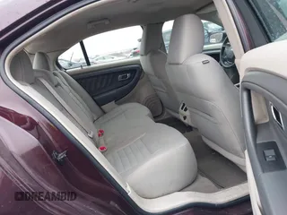 2011 Ford Taurus SE with VIN 1FAHP2DW7BG136988, listed as a IAAI auction lot 42002512 with 145,847 mi miles. Bid and sale history available at carsss.com. Image 8.