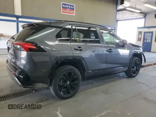 2023 Toyota RAV4 Hybrid SE with VIN JTM16RFV9PD107948, listed as a Copart auction lot 59816735 with 22,257 mi miles and Salvage title. Bid and sale history available at DreamBid. Image 3.