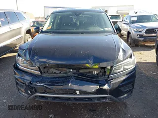 2018 Volkswagen Tiguan SEL Premium with VIN 3VV5B7AX8JM073475, listed as a IAAI auction lot 41816194 with 65,838 mi miles and . Bid and sale history available at DreamBid. Image 12.