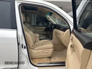 2011 Lexus LX 570 with VIN JTJHY7AX9B4071559, listed as a IAAI auction lot 41860921 with 201,449 mi miles and . Bid and sale history available at DreamBid. Image 5.