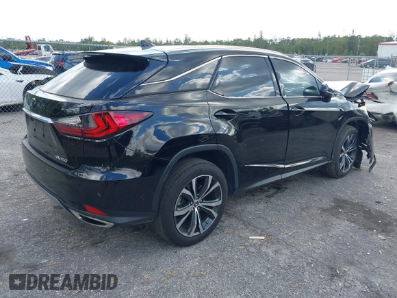 2021 Lexus RX 350 with VIN 2T2HZMAA5MC209099, listed as a IAAI auction lot 41175491 with 34,837 mi miles and . Bid and sale history available at DreamBid. Image 4.