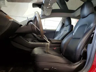 2022 Tesla Model 3 Long Range with VIN 5YJ3E1EBXNF285779, listed as a Copart auction lot 54630135 with 129,097 mi miles and Clean Title. Bid and sale history available at DreamBid. Image 7.