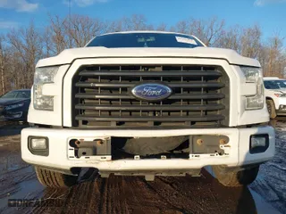 2015 Ford F-150 XLT w/HD Payload Pkg with VIN 1FTFW1EF6FFC66723, listed as a IAAI auction lot 41303476 with 203,999 mi miles. Bid and sale history available at carsss.com. Image 6.