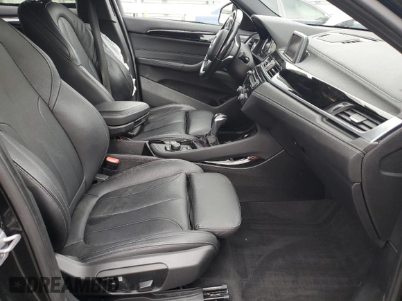 2018 BMW X2 sDrive28i with VIN WBXYJ3C34JEJ91176, listed as a Copart auction lot 63418365 with 62,586 mi miles and Salvage title. Bid and sale history available at DreamBid. Image 7.