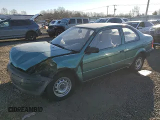 1996 Toyota Tercel DX z VIN JT2AC52L6T0170537, wystawiony jako Copart lot #42576525 z przebiegiem 66 926 mil mil oraz Szkody całkowita. Historia ofert i sprzedaży dostępna na DreamBid. Obrazek 1.