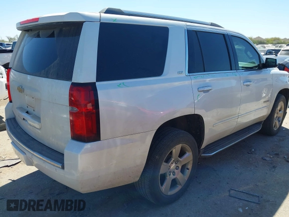 2016 Chevrolet Tahoe LTZ with VIN 1GNSCCKC1GR404754, listed as a IAAI auction lot 41831879 with 139,681 mi miles and . Bid and sale history available at DreamBid. Image 4.