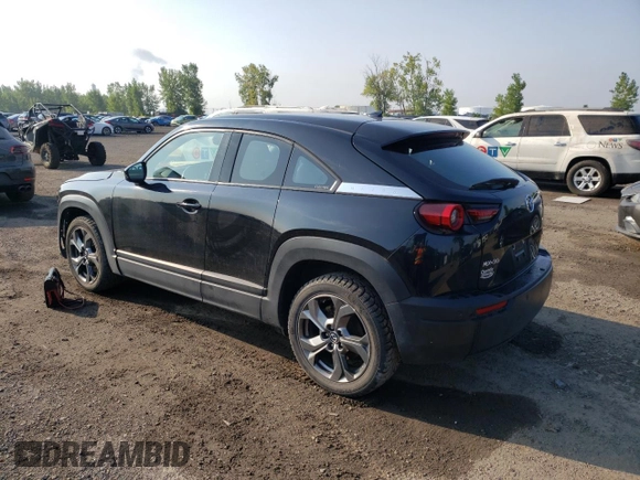 2022 Mazda MX-30 Premium Plus z VIN JM1DRADB6N0101074, wystawiony jako Copart lot #68379044 z przebiegiem 43 559 mil mil oraz Szkody całkowita. Historia ofert i sprzedaży dostępna na DreamBid. Obrazek 2.