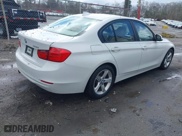 2013 BMW 3 Series 328i xDrive with VIN WBA3B5G5XDNS04574, listed as a IAAI auction lot 41935635 with 135,408 mi miles. Bid and sale history available at carsss.com. Image 4.