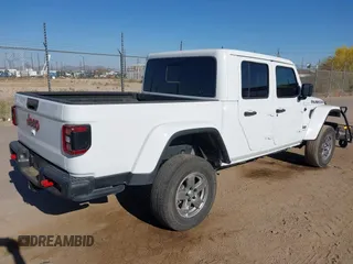 2020 Jeep Gladiator Rubicon with VIN 1C6JJTBG6LL187235, listed as a IAAI auction lot 42010374 with Not Provided miles and . Bid and sale history available at DreamBid. Image 4.