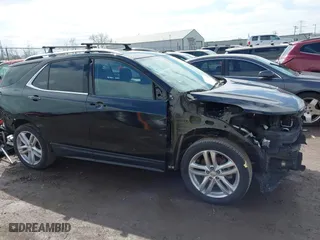 2018 Chevrolet Equinox Premier with VIN 2GNAXWEX4J6252486, listed as a IAAI auction lot 41925794 with 136,040 mi miles. Bid and sale history available at carsss.com. Image 14.