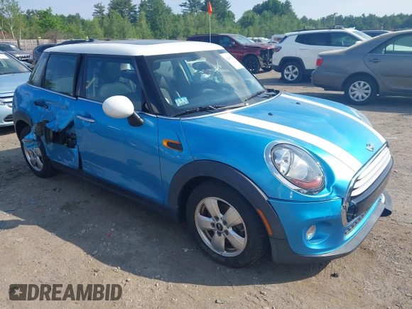 2015 MINI Hardtop 4 Door z VIN WMWXS5C51FT829693, wystawiony jako IAAI lot #42497639 z przebiegiem 36 494 mil mil oraz . Historia ofert i sprzedaży dostępna na DreamBid. Obrazek 1.
