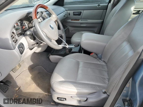 2005 Mercury Sable LS z VIN 1MEFM55S15A634567, wystawiony jako Copart lot #53136945 z przebiegiem 85 396 mil mil oraz Szkody całkowita. Historia ofert i sprzedaży dostępna na DreamBid. Obrazek 7.