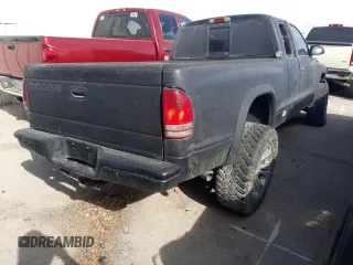 2000 Dodge Dakota SLT with VIN 1B7GG22X1YS655459, listed as a Copart auction lot 84569564 with 240,478 mi miles and Non Repairable. Bid and sale history available at DreamBid. Image 3.