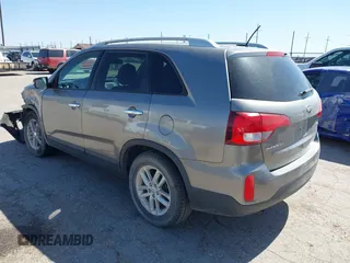 2015 Kia Sorento LX with VIN 5XYKTCA69FG584972, listed as a IAAI auction lot 42315973 with 165,907 mi miles and . Bid and sale history available at DreamBid. Image 3.