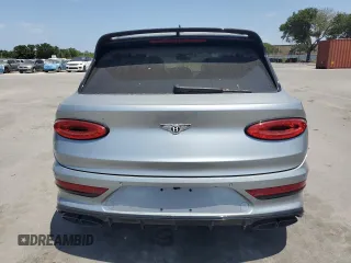 2022 Bentley Bentayga V8 z VIN SJAAM2ZV9NC011752, wystawiony jako Copart lot #54847785 z przebiegiem Nie podano mil oraz Nie do naprawy. Historia ofert i sprzedaży dostępna na DreamBid. Obrazek 6.