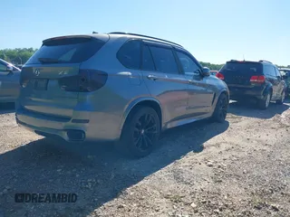 2014 BMW X5 xDrive35i z VIN 5UXKR0C5XE0K42788, wystawiony jako IAAI lot #42263399 z przebiegiem 138 644 mil mil oraz . Historia ofert i sprzedaży dostępna na DreamBid. Obrazek 4.