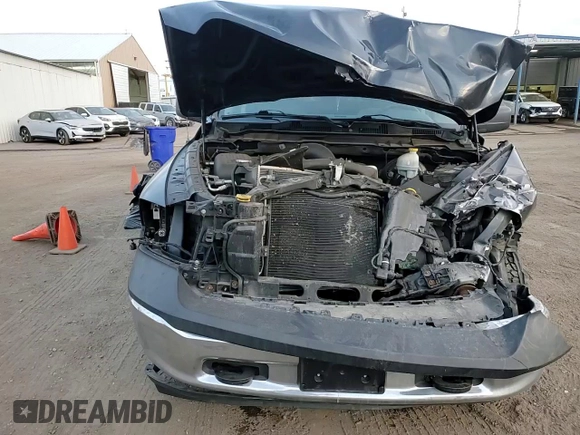 2015 Ram 1500 Tradesman with VIN 3C6RR7KT0FG631453, listed as a Copart auction lot 41441115 with 104,616 mi miles and Salvage title. Bid and sale history available at DreamBid. Image 10.