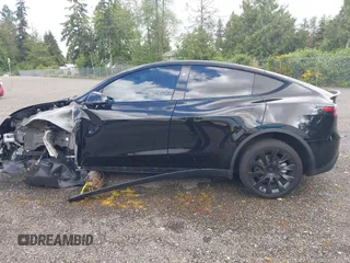 2023 Tesla Model Y Long Range z VIN 7SAYGDEE2PF885116, wystawiony jako IAAI lot #40091902 z przebiegiem 11 779 mil mil oraz . Historia ofert i sprzedaży dostępna na DreamBid. Obrazek 14.