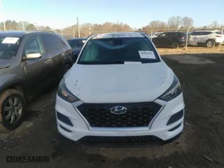 2019 Hyundai Tucson Value with VIN KM8J3CA4XKU894613, listed as a IAAI auction lot 41527548 with 139,734 mi miles. Bid and sale history available at carsss.com. Image 13.