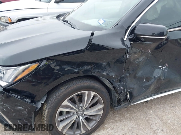 2018 Acura MDX Technology z VIN 5J8YD3H52JL009230, wystawiony jako IAAI lot #42413472 z przebiegiem 61 306 mil mil oraz . Historia ofert i sprzedaży dostępna na DreamBid. Obrazek 6.