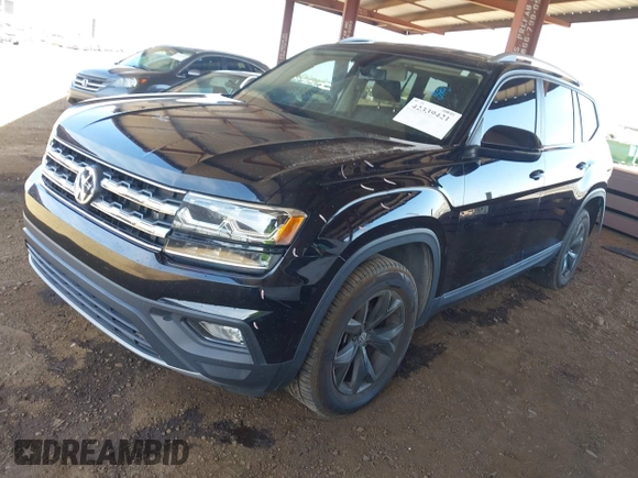 2018 Volkswagen Atlas SE with VIN 1V2CP2CA1JC600999, listed as a IAAI auction lot 42339421 with 133,490 mi miles and . Bid and sale history available at DreamBid. Image 2.